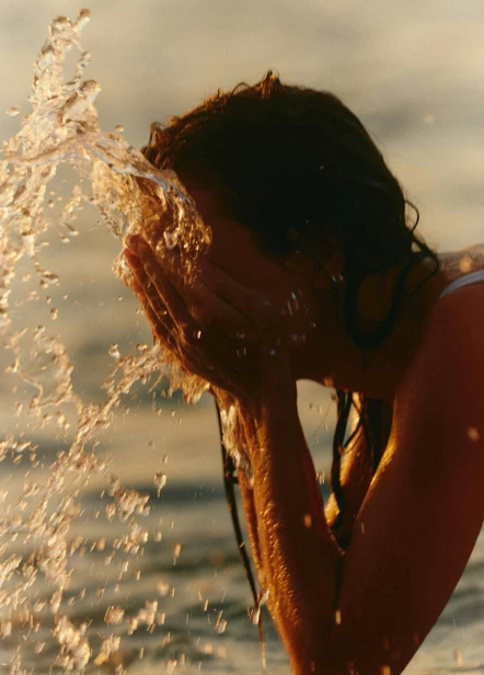 Two people gently holding hands, representing emotional support and wellness.