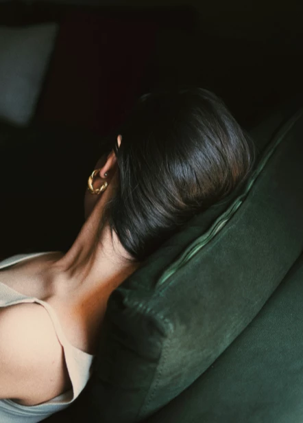 Close-up of a thoughtful person, evoking restorative rest and healing.