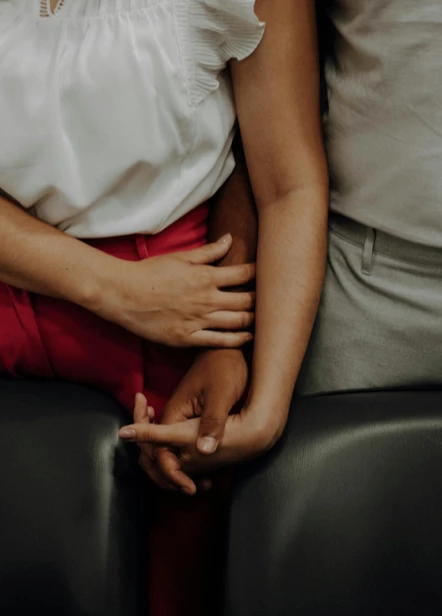 Hands typing on a laptop, symbolizing attentive support available day and night.