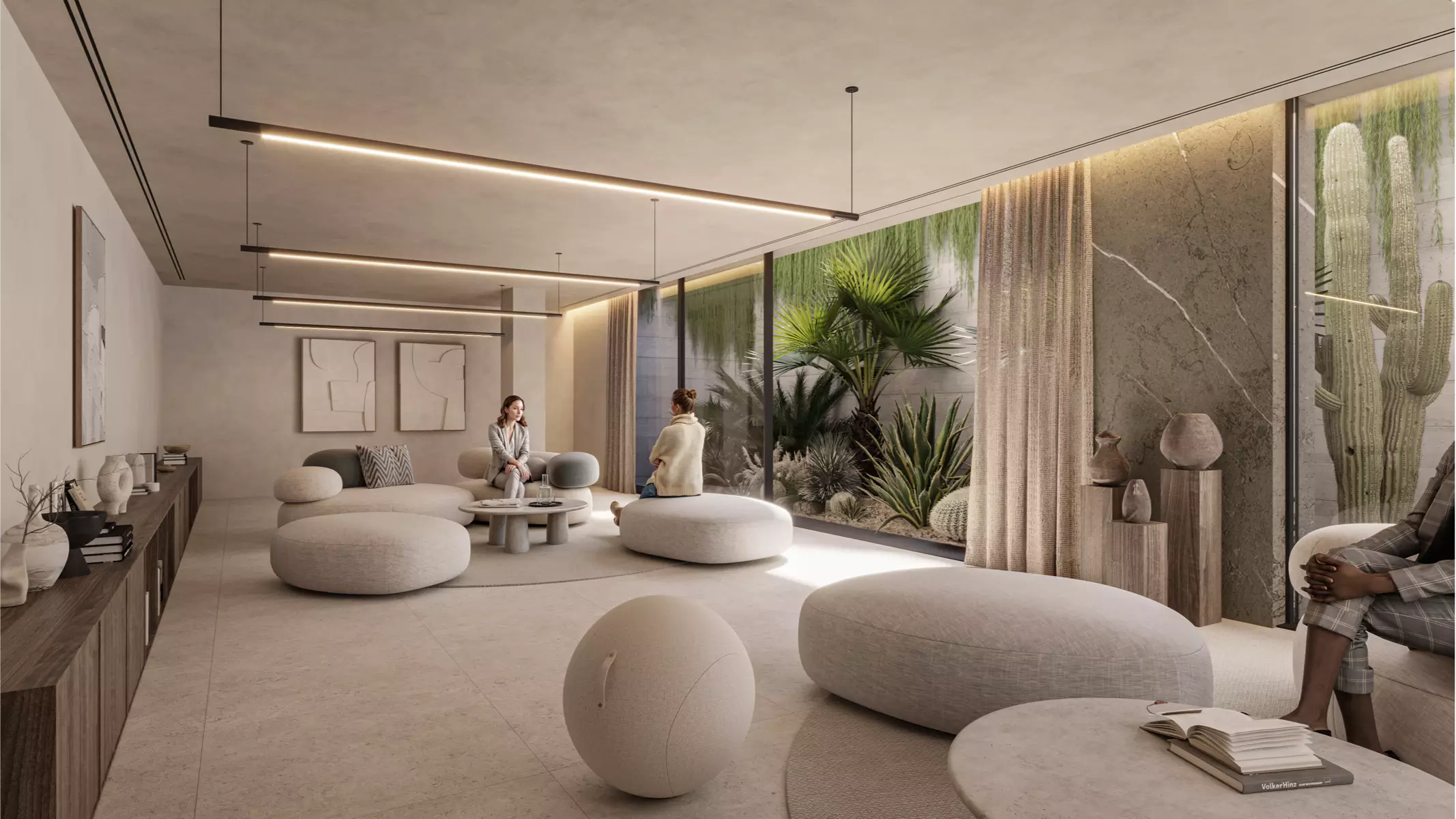 Interior lounge at Naghoi with natural textures, soft lighting, and garden views—created to foster calm, intimacy, and post-surgical comfort.