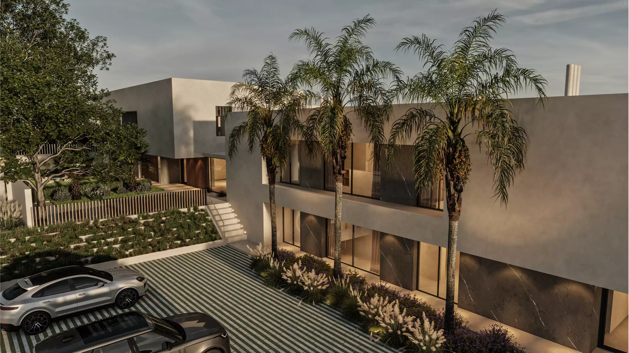 Entrance view of Naghoi recovery center with palm trees, landscaped gardens, and parking, designed to offer privacy and tranquility from arrival.